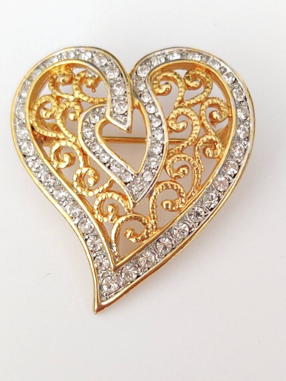 Gold filigree heart brooch with clear crystals